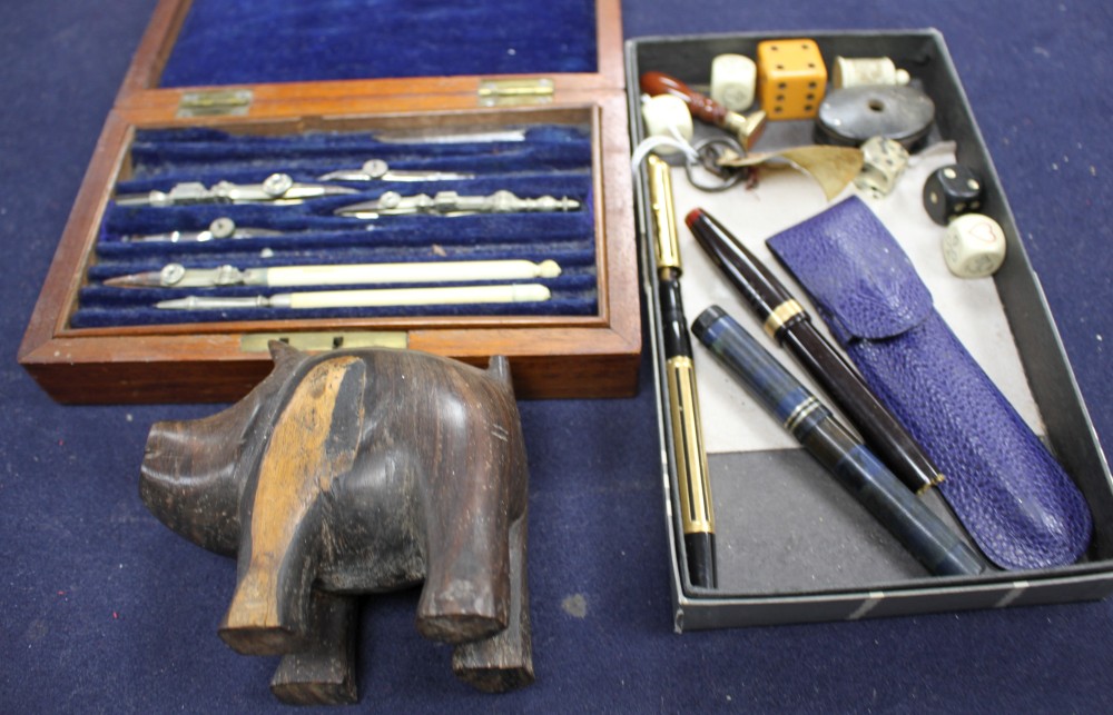 A wooden cased technical drawing set, signed Elliott, four pens, a desk seal and sundries